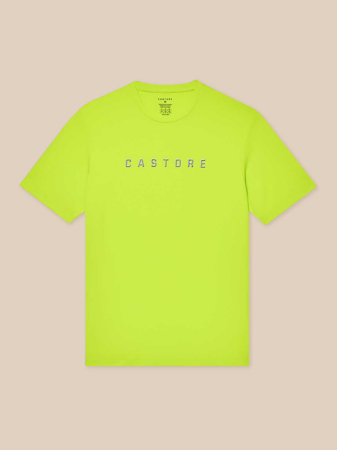 Bright lime Castore graphic training T shirt laid flat with crew neck and short sleeves