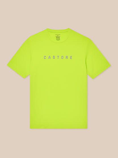 Bright lime Castore graphic training T shirt laid flat with crew neck and short sleeves
