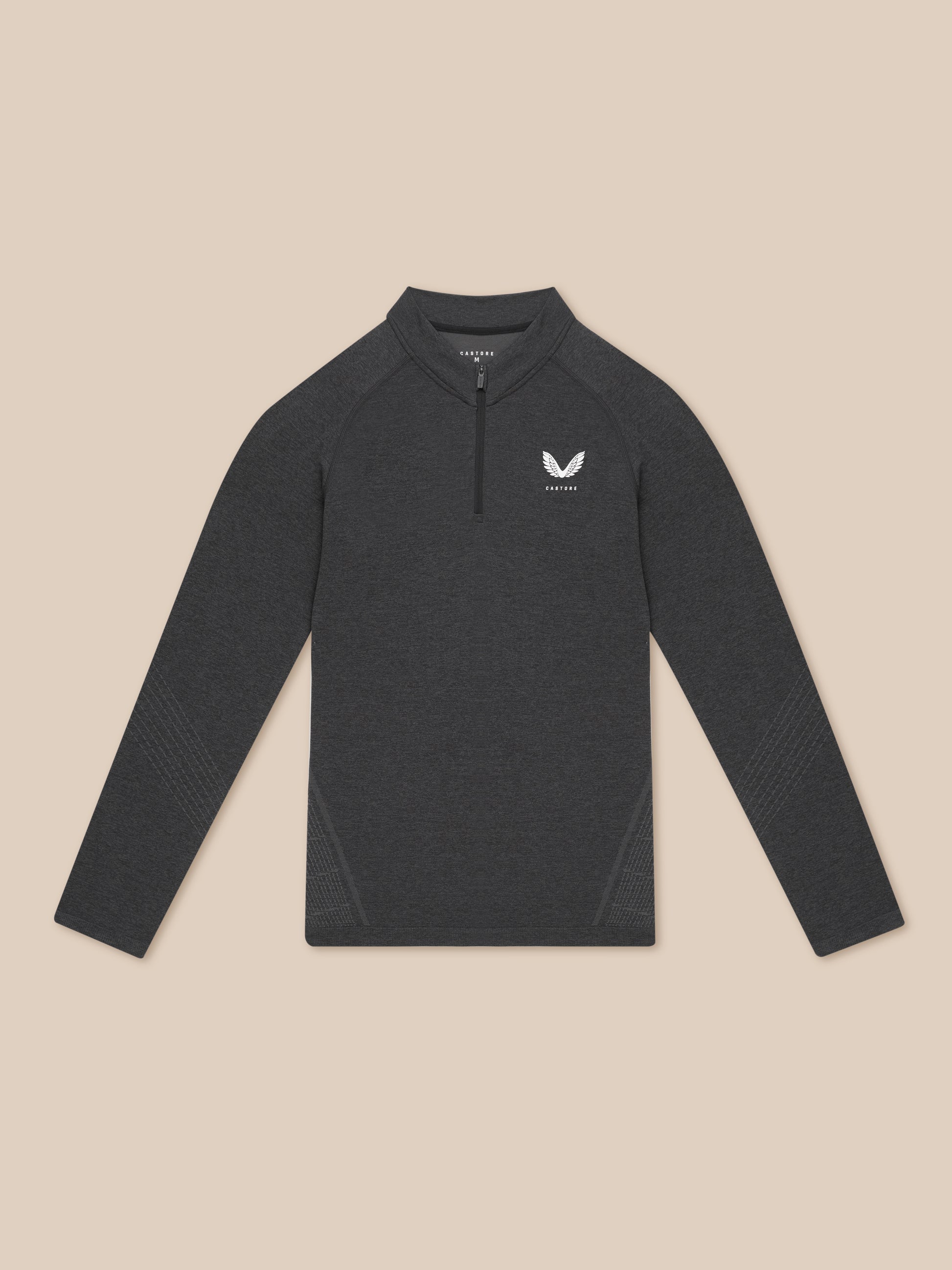 Flow Training 1/4 Zip Top in dark charcoal front view showing left chest Castore logo and quarter zip