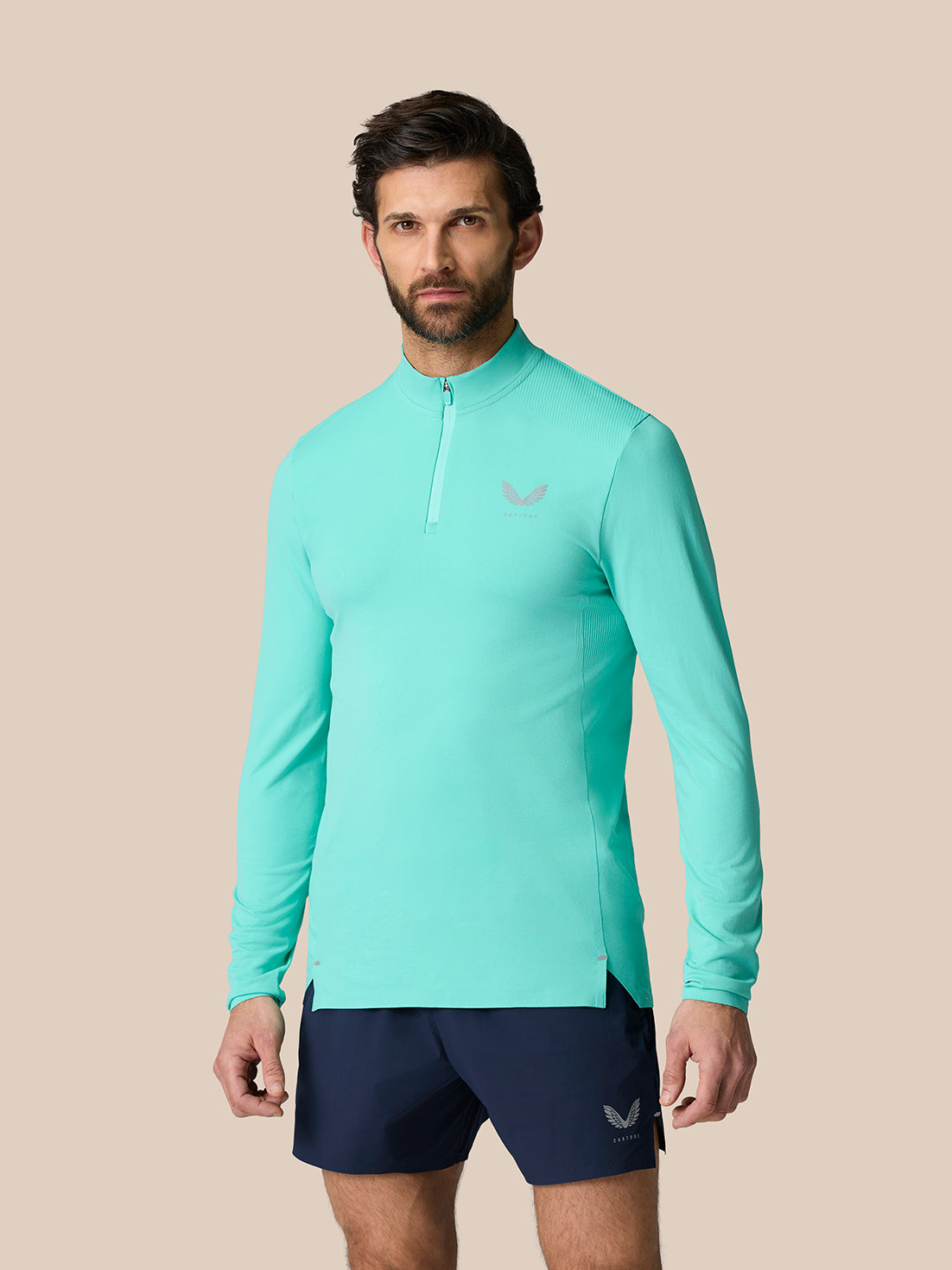 Front view of light aqua Zone Training 1/4 Zip Top on a model with long sleeves and zip neck.