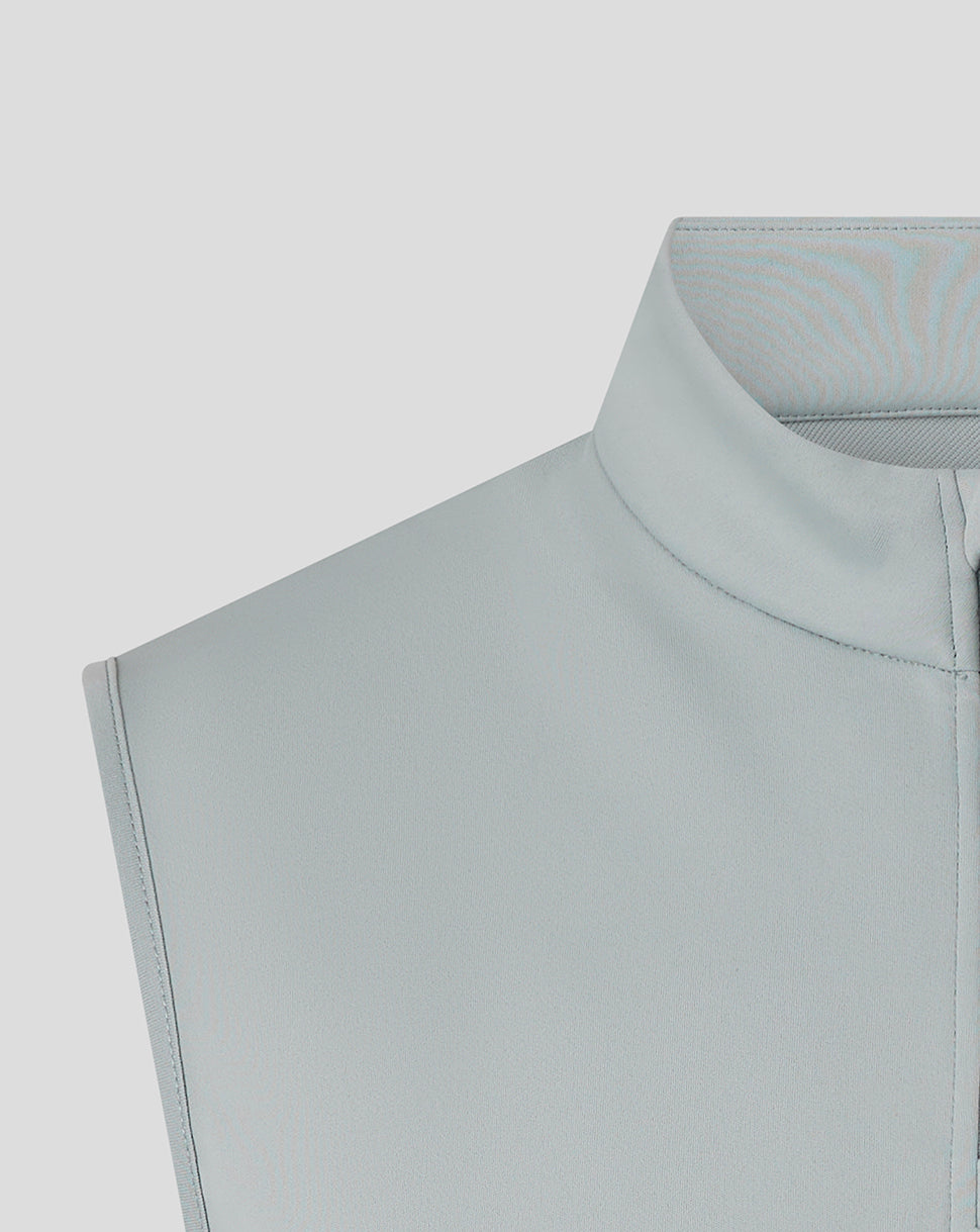 Close-up of the shoulder and collar area of the grey Majesticks Gilet highlighting the high neck seam and Castore branding along the back.