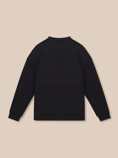 Back view of a black crew neck sweatshirt with a relaxed fit