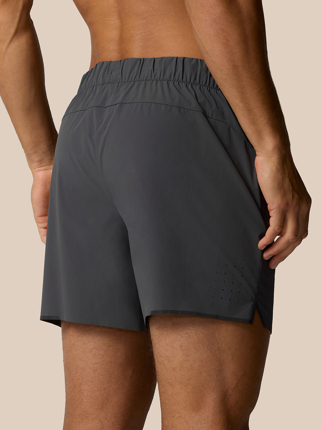 Back view of a man wearing Zone Training LVS 5 inch shorts in gunmetal
