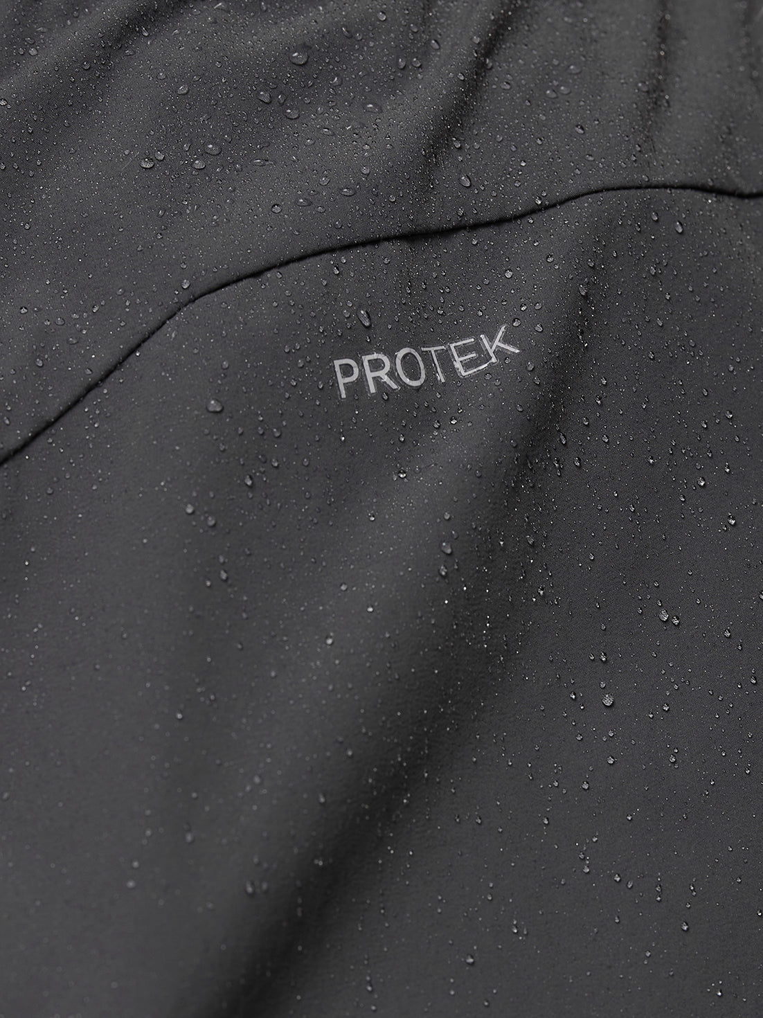 Close-up of gunmetal ProTek fabric with droplets on Zone Training LVS shorts