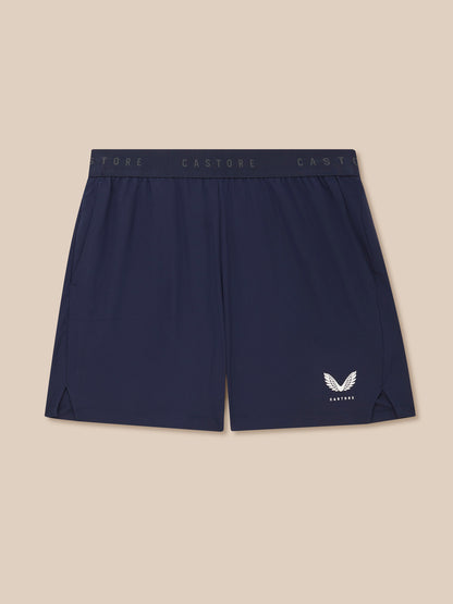 Back view of navy Adapt 5 Inch Shorts showing waistband branding and Castore logo on leg
