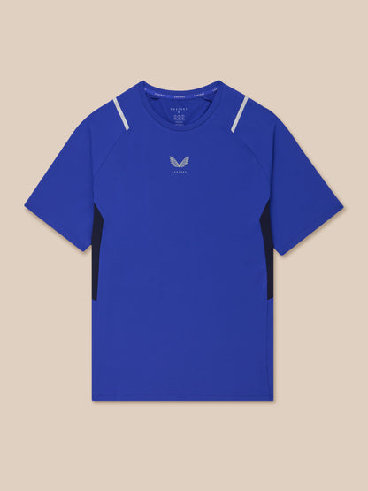 Azure blue Apex Training T Shirt with mesh panels, raglan sleeves and reflective shoulder accents, featuring a centered Castore logo