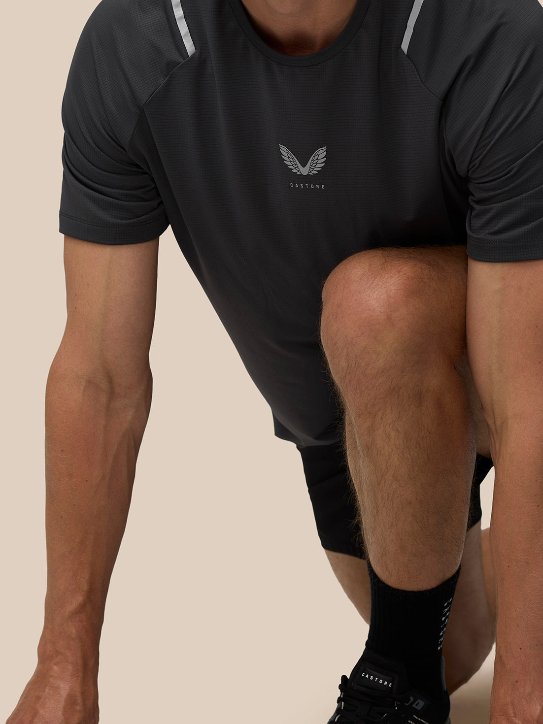 Apex Training T Shirt gunmetal with reflective shoulder accents and Castore logo at the center chest