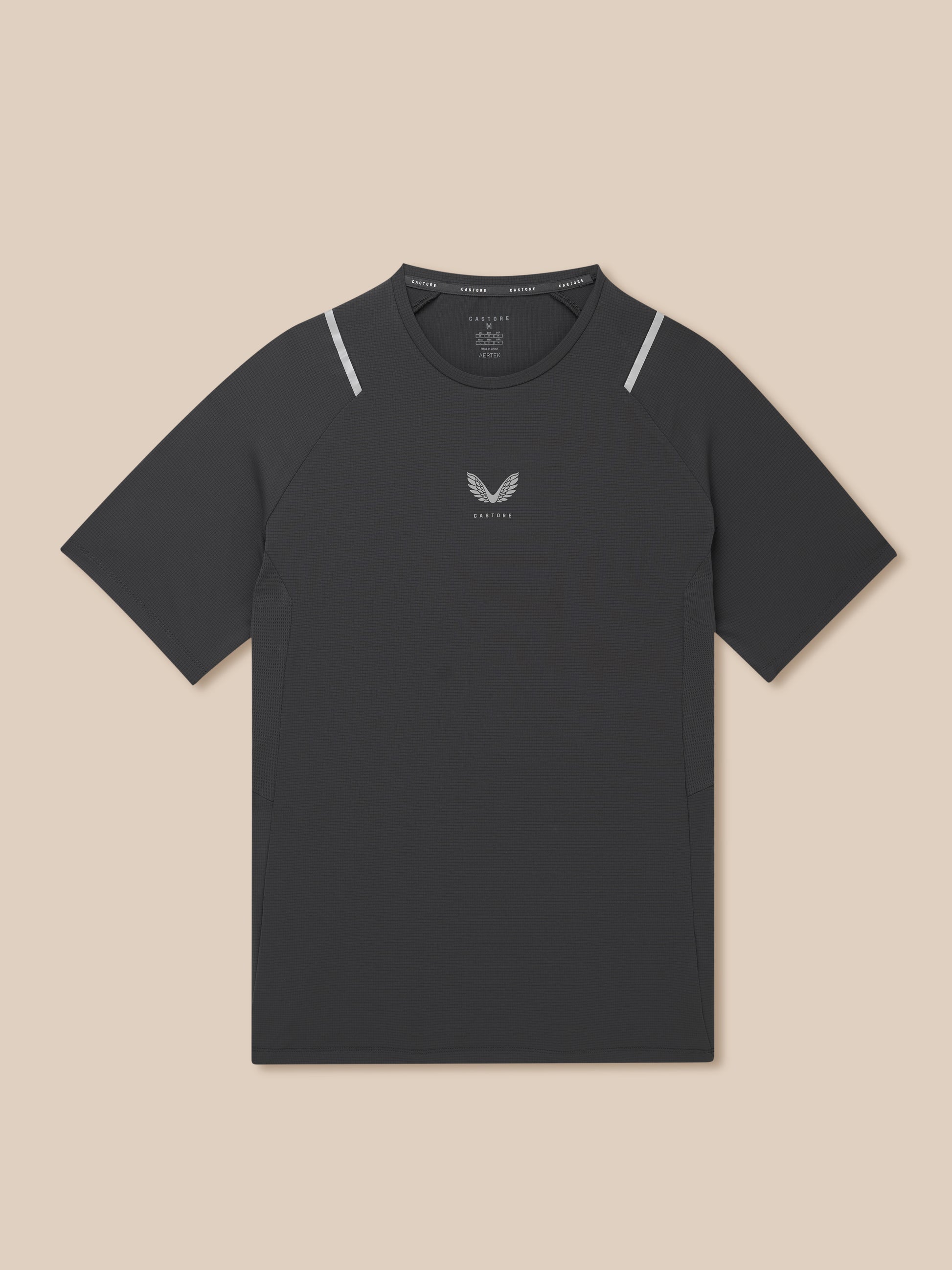 Gunmetal Apex training T shirt with reflective silver shoulders and center chest Castore logo on textured knit fabric