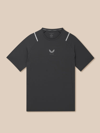Gunmetal Apex training T shirt with reflective silver shoulders and center chest Castore logo on textured knit fabric