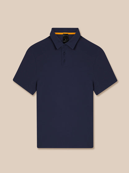 Navy Elevated Lifestyle Polo displayed flat with collar and button placket.