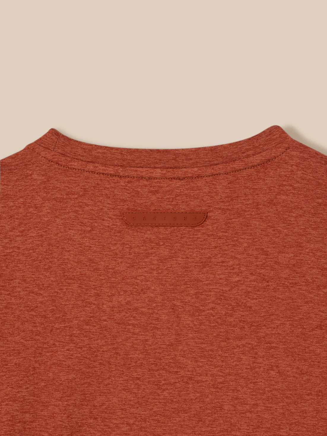 Back view of rust T shirt with Castore badge identifier on the upper back