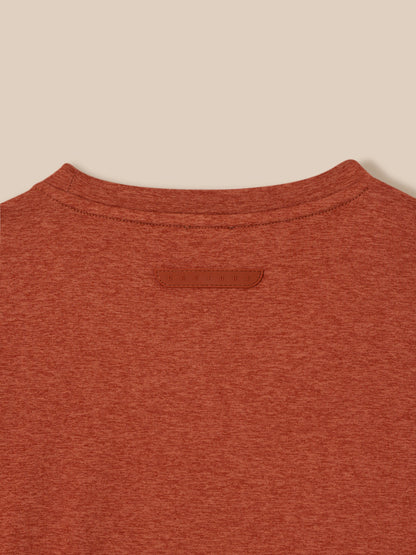 Back view of rust T shirt with Castore badge identifier on the upper back