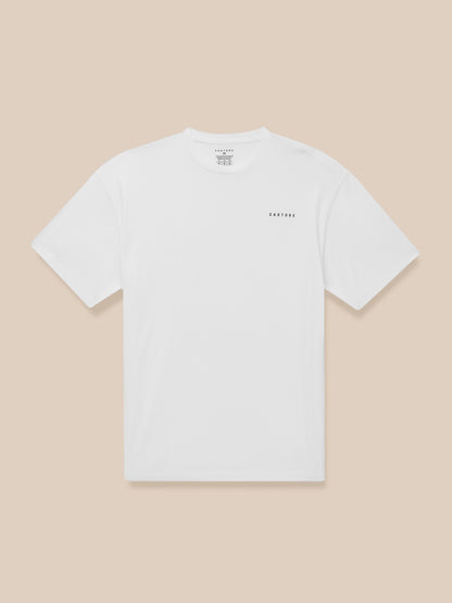 Male model wearing a white short sleeve crew neck T shirt with a small CASTORE logo on the chest