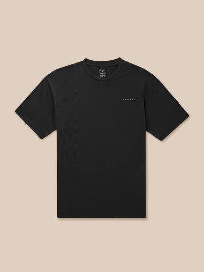 Front view of a black Castore Flex Cotton T-Shirt with rounded neckline and small chest logo.
