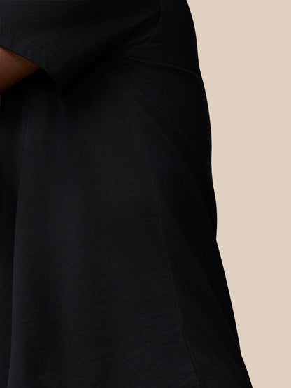 Upper torso view of a black Castore Flex Cotton T-Shirt, showcasing a round neckline and chest logo.