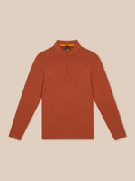 Flat lay shows the dark rust Elevated Lifestyle quarter zip top with a center front zipper on a beige background