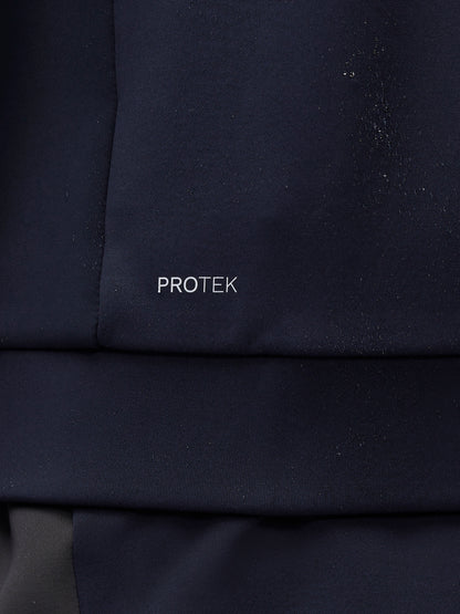 Close-up of navy sleeve with water droplets and ProTek logo on the sleeve.