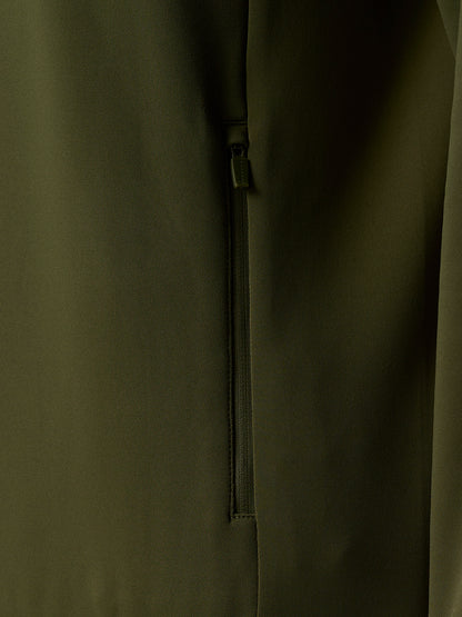 Close-up of olive green hoodie side zipper on the Flex Thermo design with textured knit fabric
