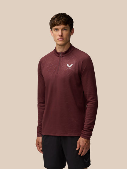Adapt Training 1/4 Zip Top in Plum Mint with geometric all over print and Castore logo on chest