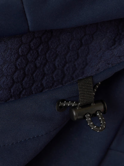 Close-up of navy Garcia 3.0 Hoodie interior showing quilted lining and drawcord adjuster.