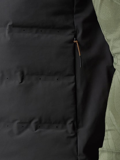 Close up of the gilet back showing a lower back zippered pocket and ventilation holes