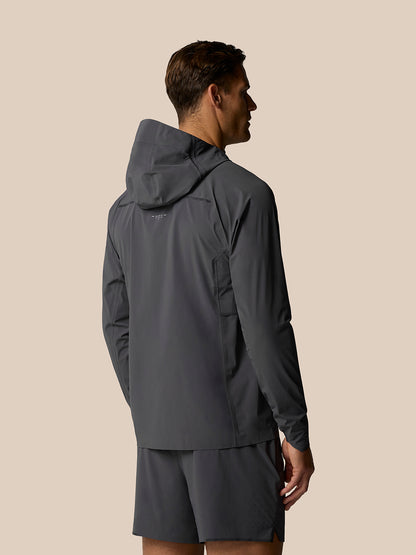 Back view of Zone Training LVS Jacket on a male model highlighting the hood and vent design