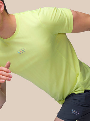 Lime performance engineered knit short sleeve tee with knit stripe pattern and Castore Paul Smith branding.