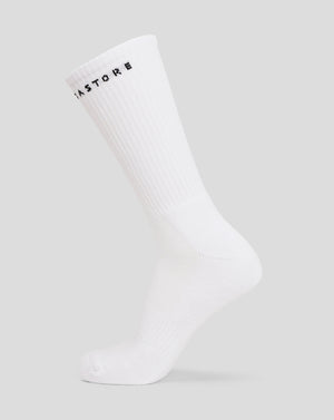 White men's basic crew sock from a two pack displayed diagonally.