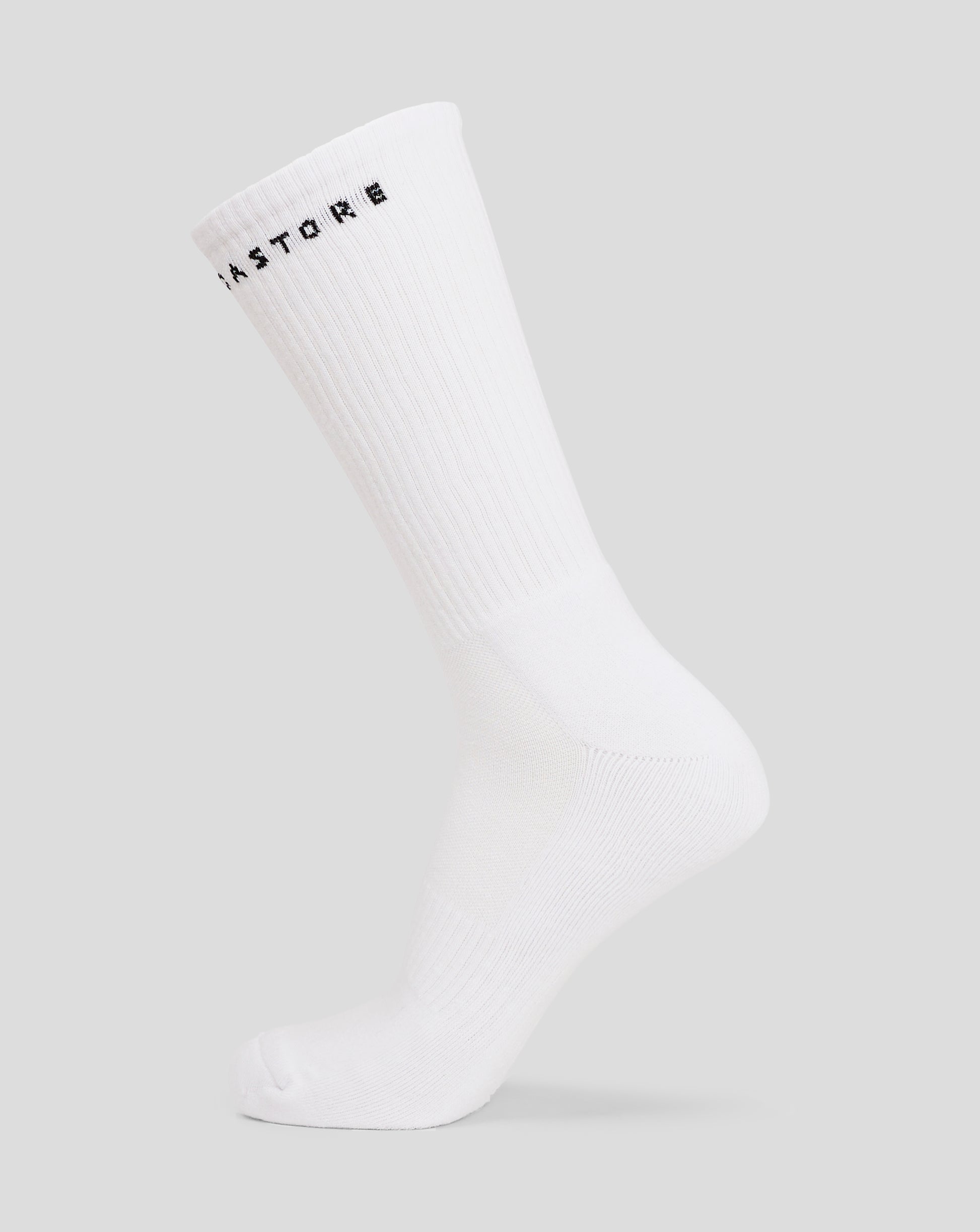 White juniors crew sock with black lettering around the ribbed cuff.
