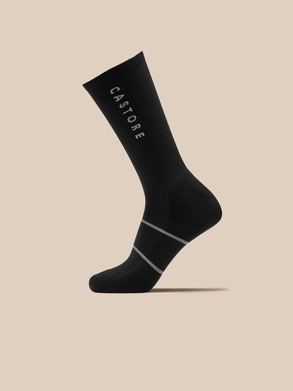 Black Castore crew sock with vertical logo and light gray stripes, part of the Active 3 Pack.