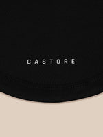 Close-up of black snood fabric with Castore branding visible.