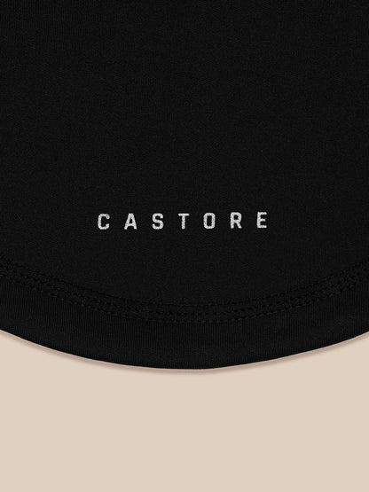 Close-up of black snood fabric with Castore branding visible.