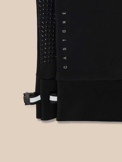 Close-up of black Pursuit glove showing mesh wrist panel and reflective Castore wordmark