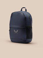 Front view of navy Active Backpack showing top handle, front zipper, Castore logo, and side mesh pocket