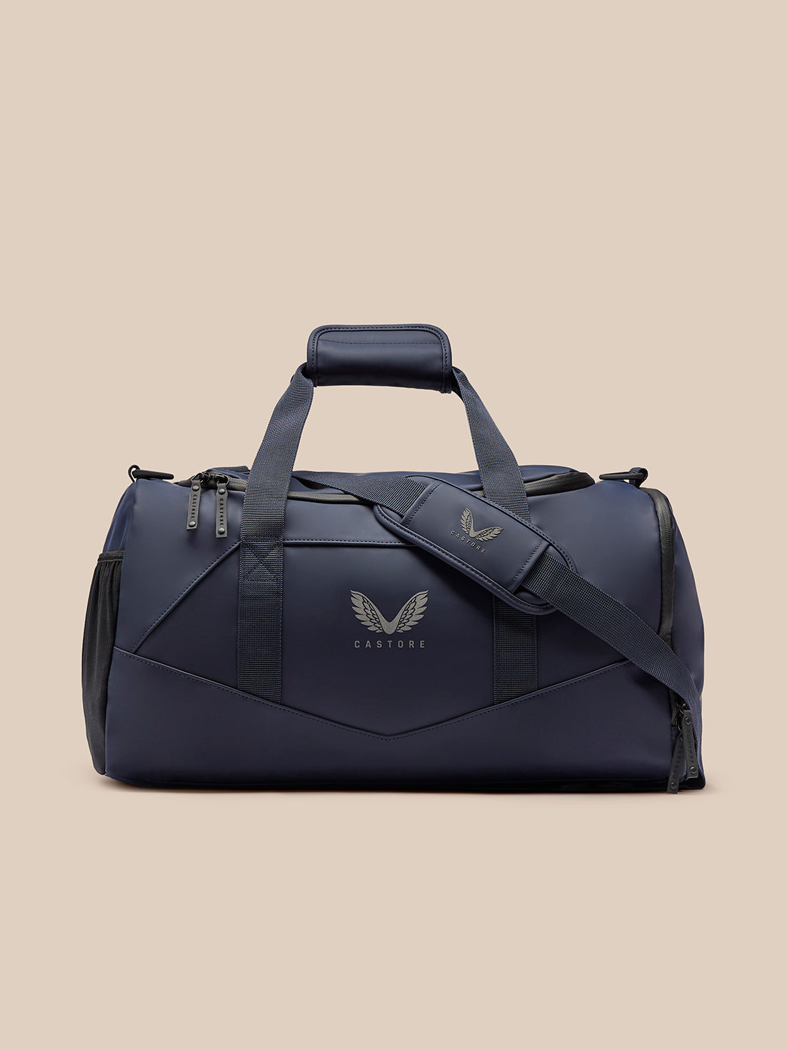 Navy holdall with padded handle and detachable shoulder strap, Castore logo visible