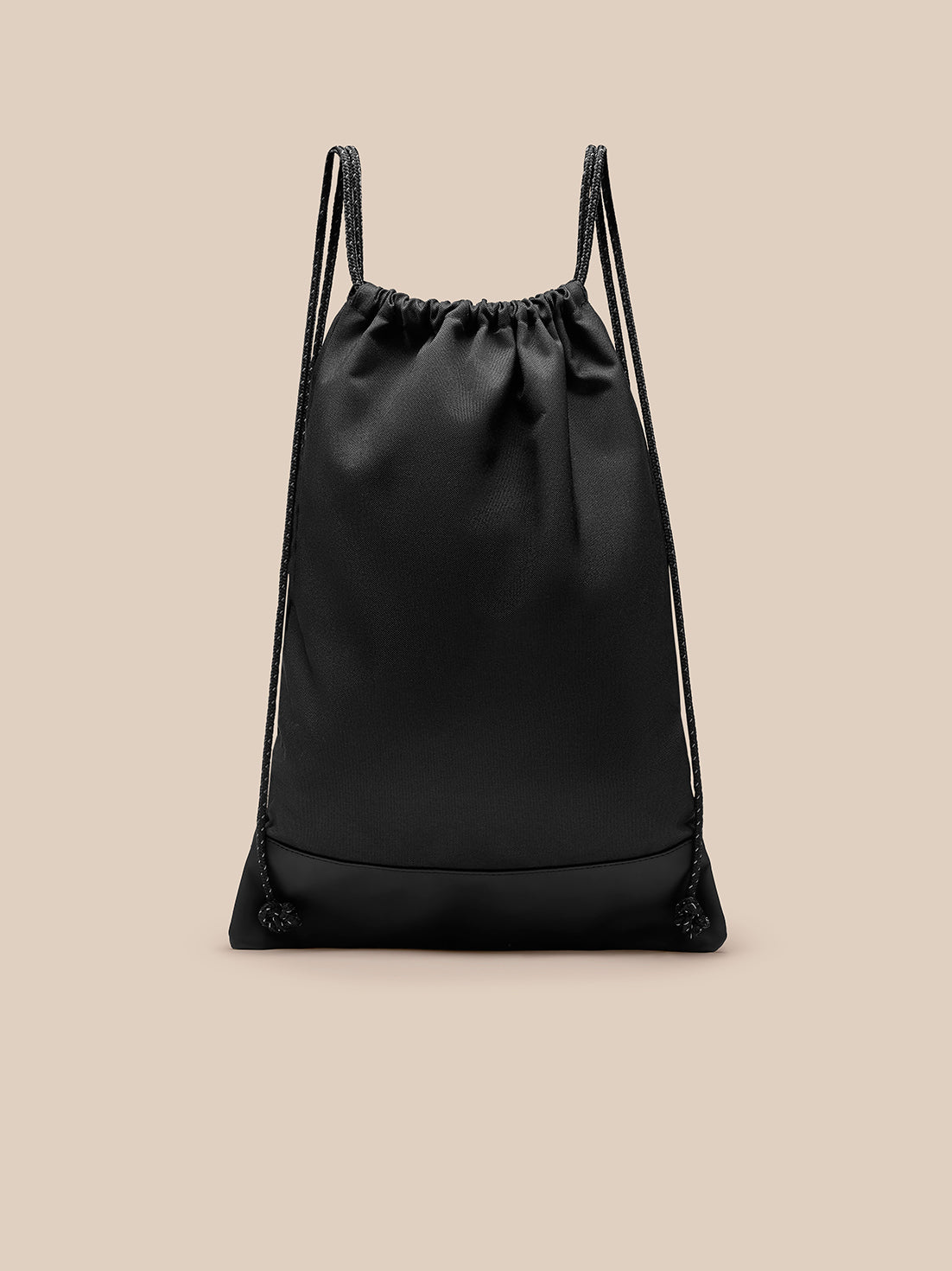 Black gym sack shown from the front with drawstrings and Castore logo.