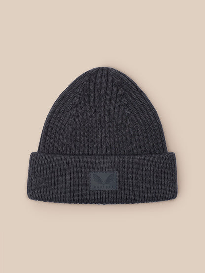 Dark grey ribbed knit beanie with folded cuff and Castore patch