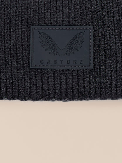 Beanie focusing on knit texture with folded cuff and Castore patch