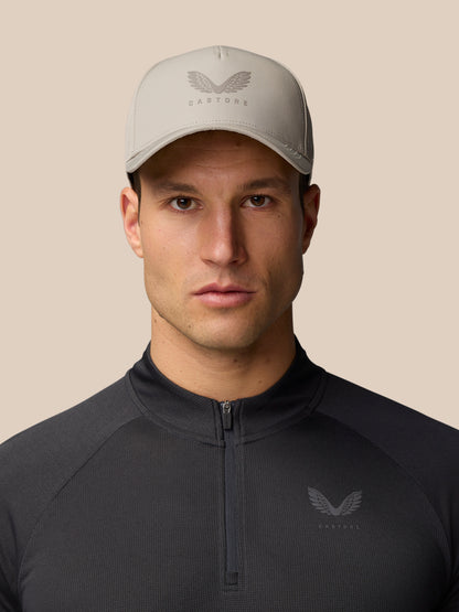 Beige Castore Active Cap worn by a model