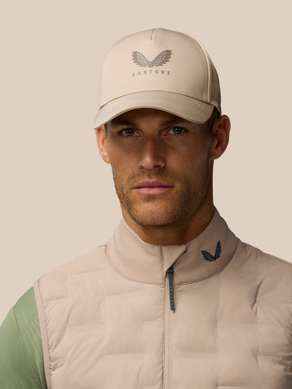 Mushroom colored Active Cap with Castore logo on front and halo eyelets for breathability.
