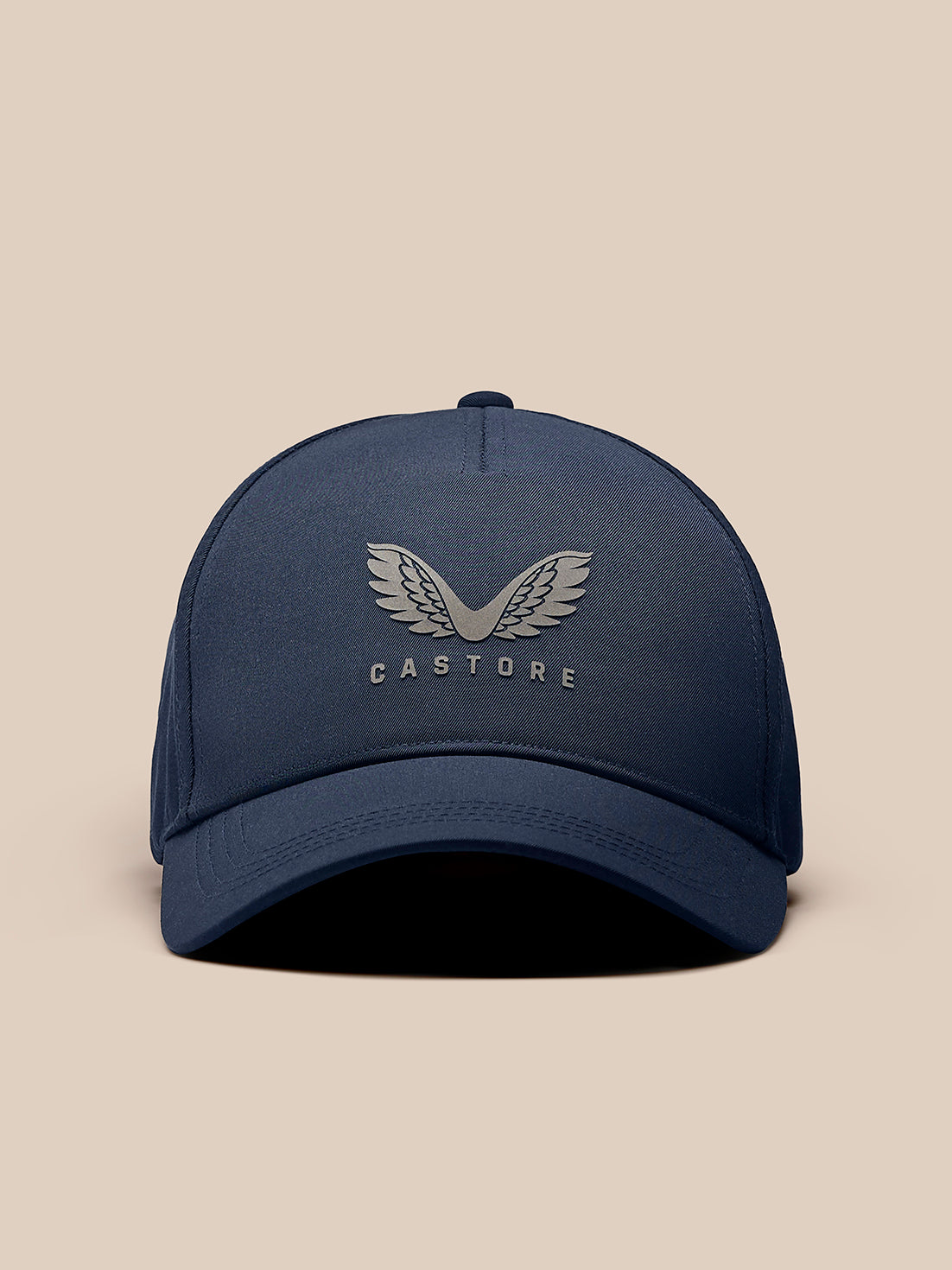 Navy cap with silver Castore wing emblem centered on the front