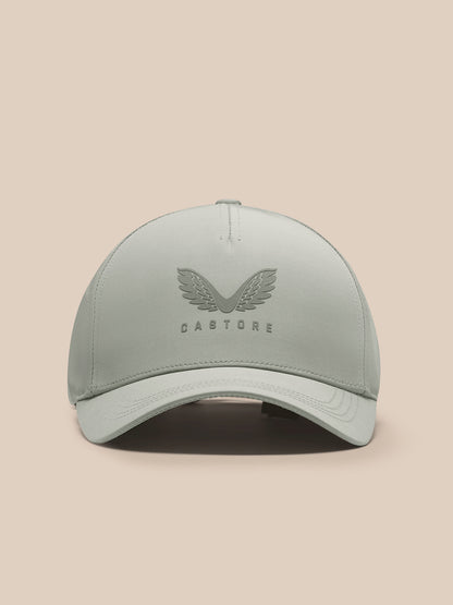 Front view of sage Active Cap with Castore wing logo on the front panel and curved brim