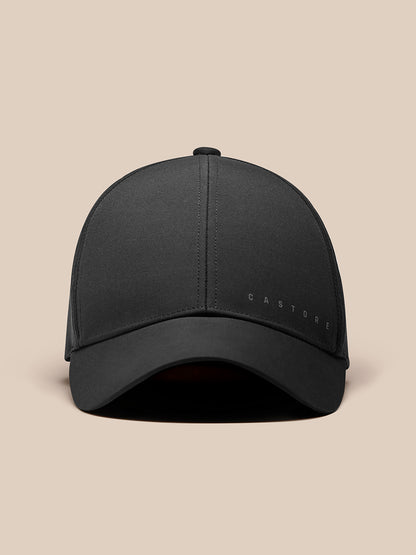 Front view of black Zone Cap with curved brim and Castore branding on the front panel