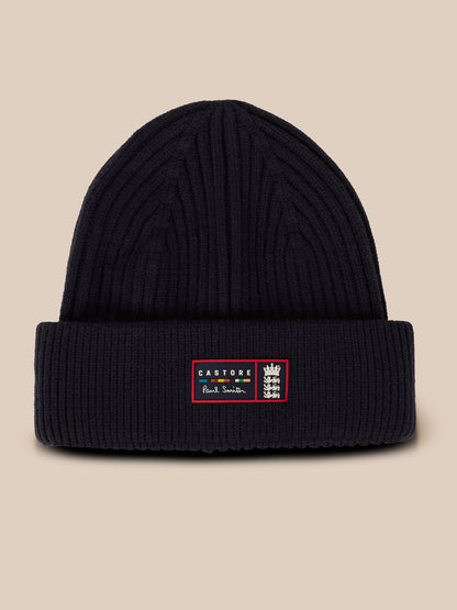 Navy knit beanie with a folded cuff and a front patch featuring Castore Paul Smith branding and the England crest.