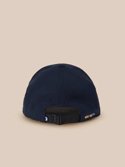 Back view of navy Paul Smith x Castore England Training Cap with adjustable strap and side stripe