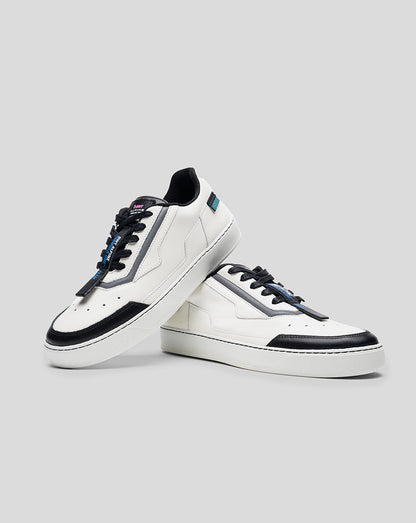 Pair of white Alpine Endstate sneakers with black trim and blue accents, side view.