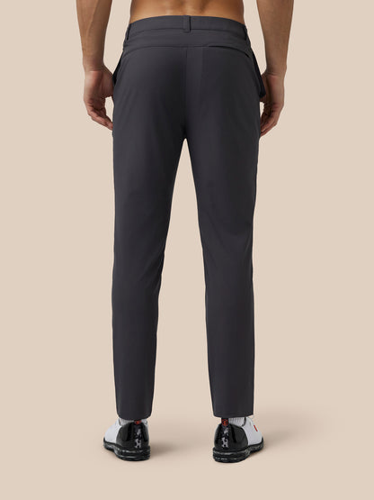 Back view of men's grey golf trousers showing welt back pocket and Protek branding.