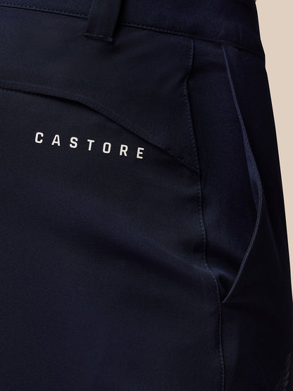 Close-up of the back pocket area on Midnight Navy Golf Lightweight Club Trousers with Castore branding