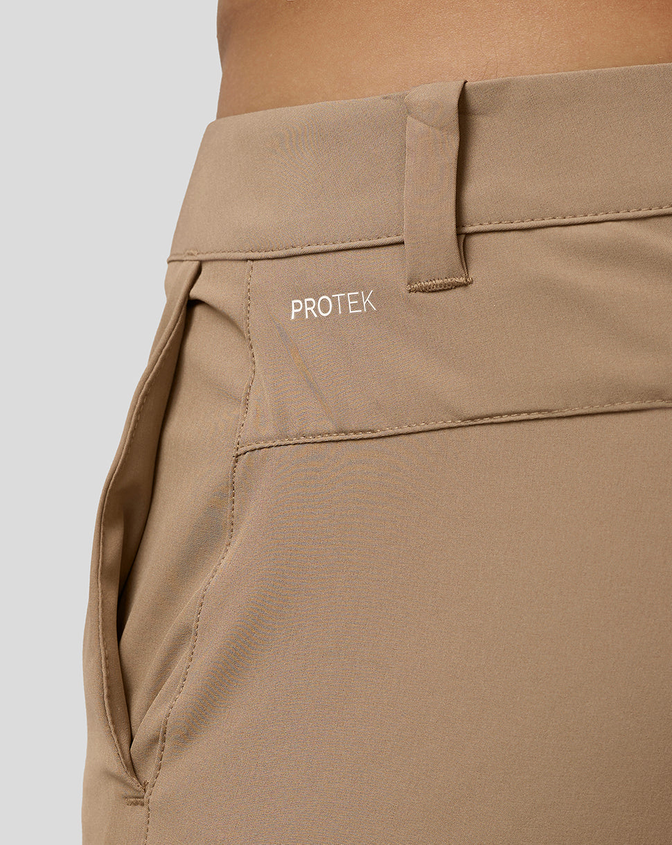 Beige golf shorts close up of back pocket area with Protek branding on the left rear waistband