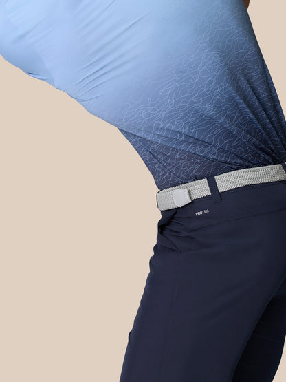 Close-up of navy Golf Club Shorts with woven belt and ProTek branding at the back waist